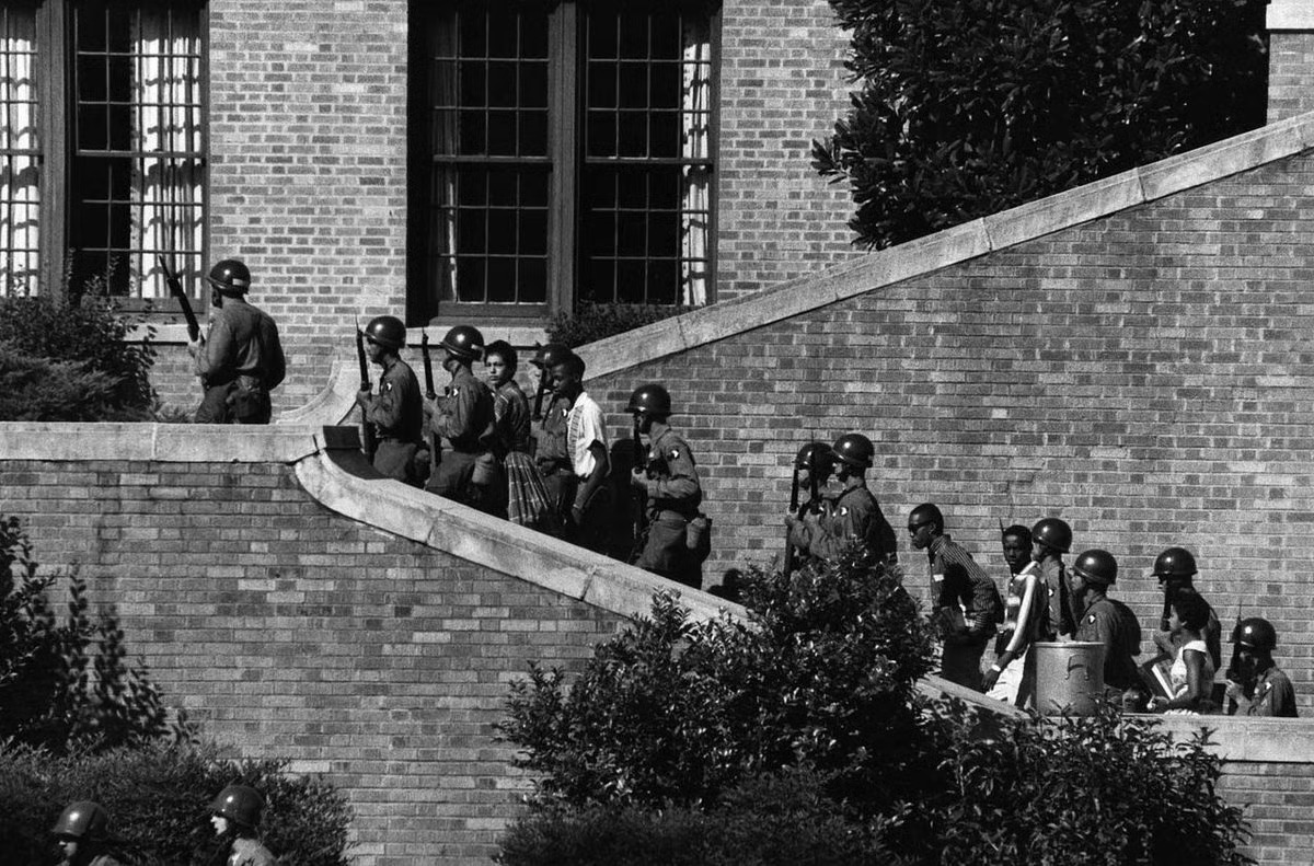 Little Rock Nine escorted
